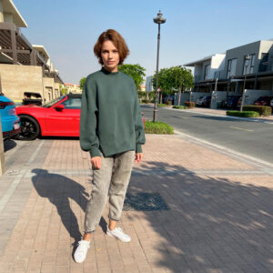 060 A sweater model with zippers on the sides